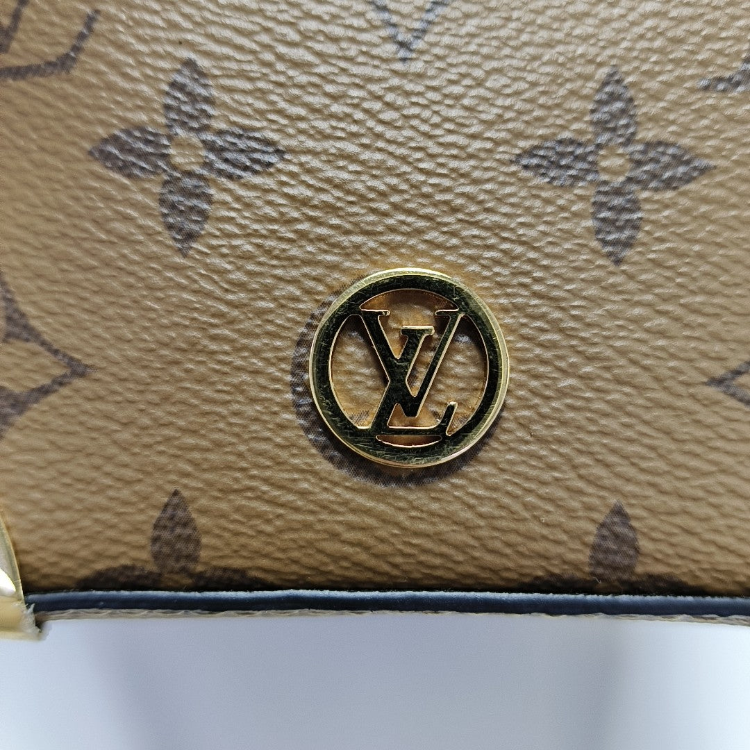 NOÉ PURSE LV CHARMS Monogram Coated Canvas Brown