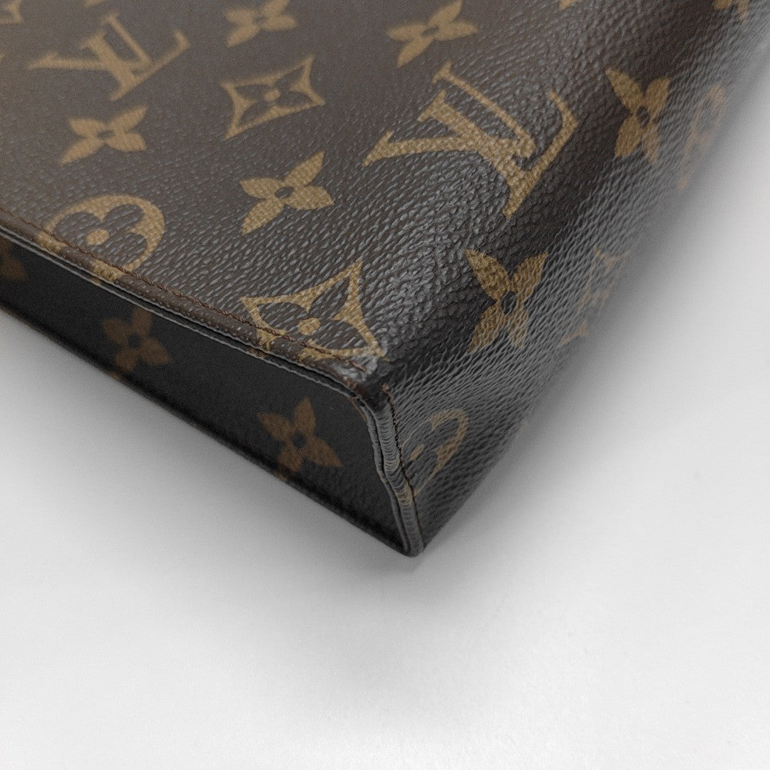 TOILET POCKET 26 Monogram Coated Canvas Brown