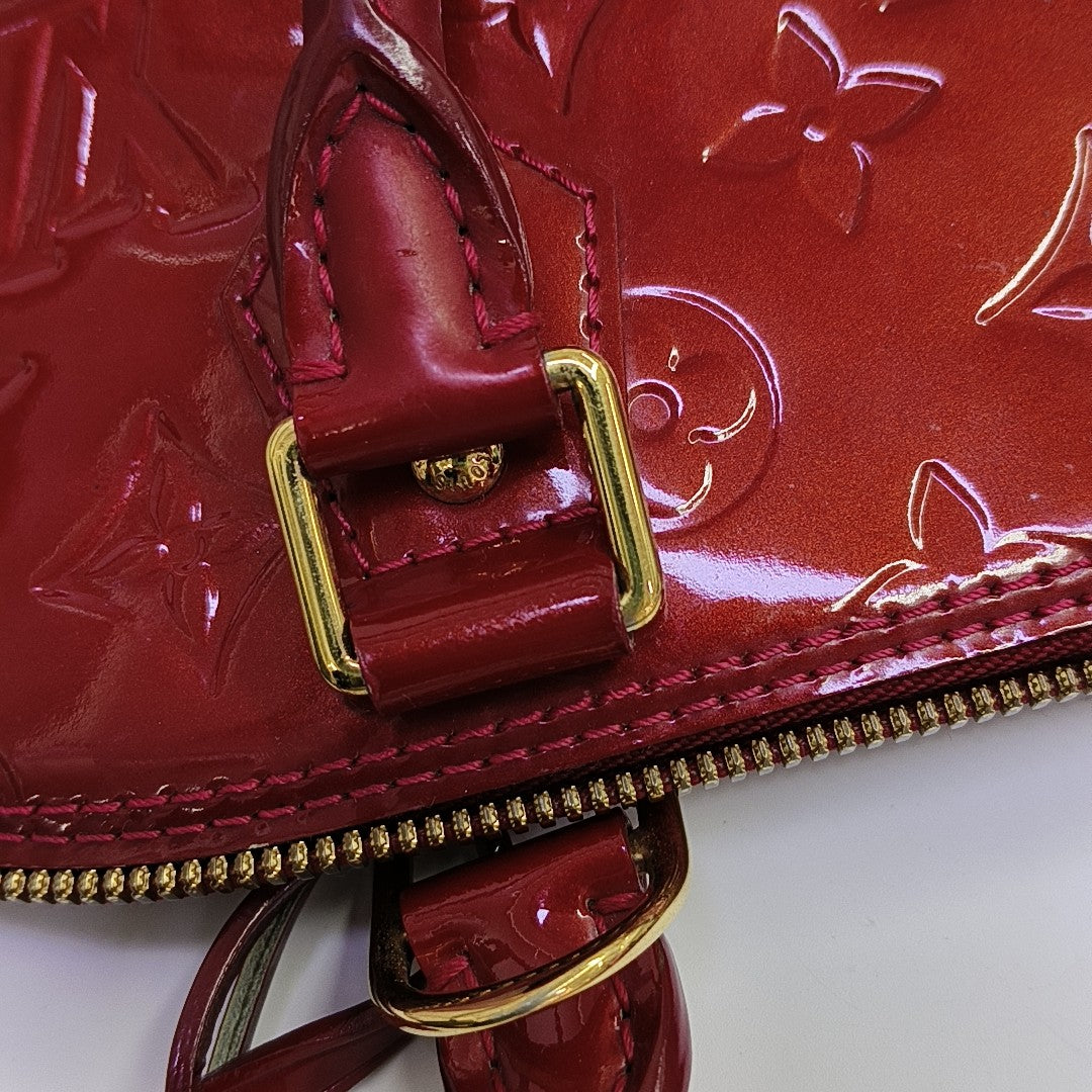 ALMA PM Monogram Patent Leather Red