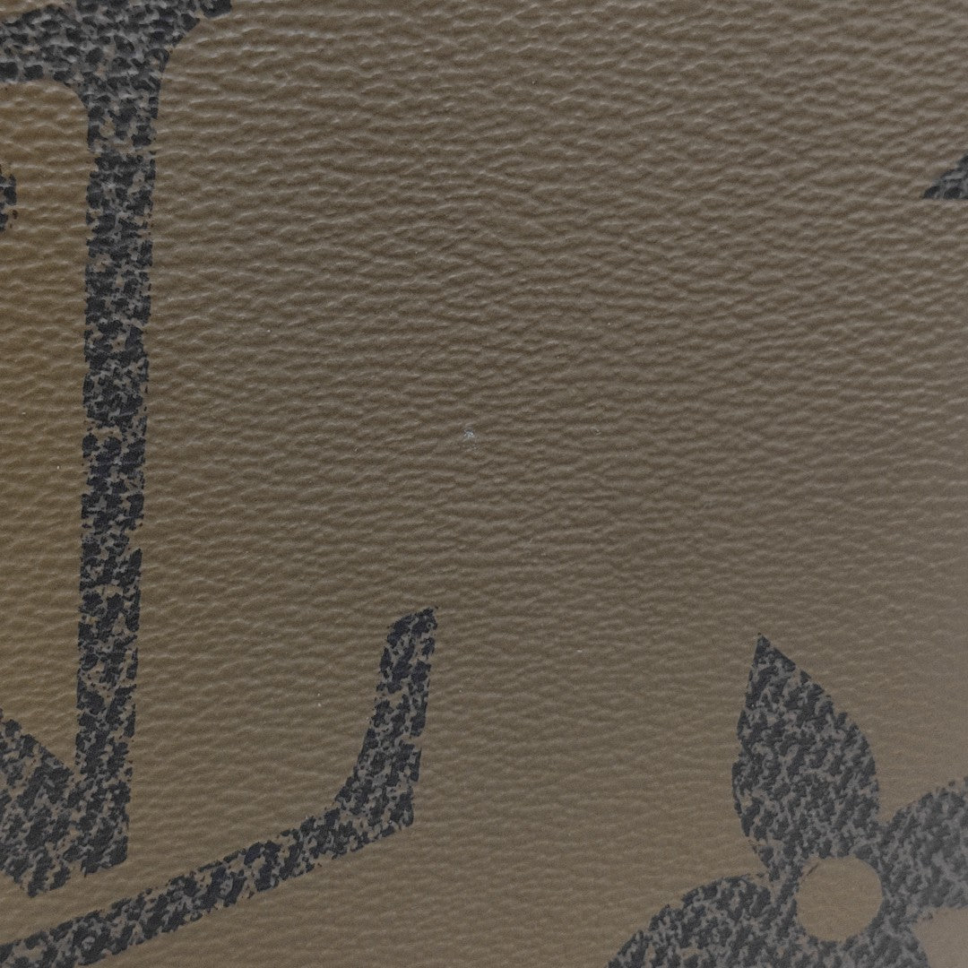 ONTHEGO MM Monogram Coated Canvas Brown