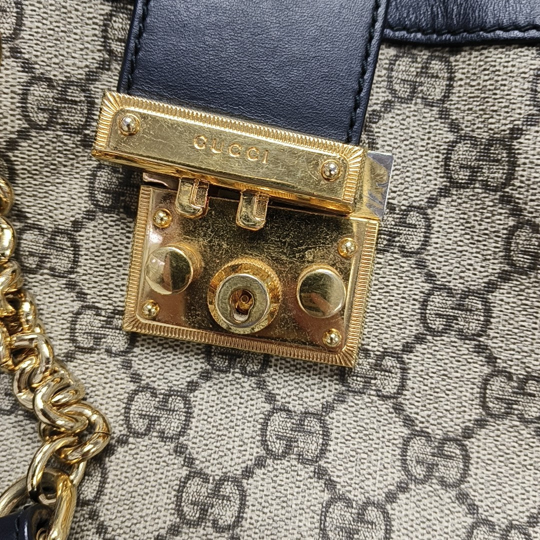 Padlock Small Monogram Coated Canvas Beige