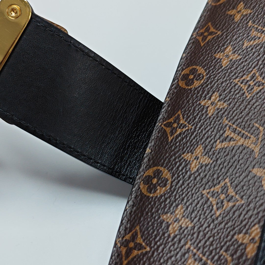 TRUNK Monogram Coated Canvas Brown
