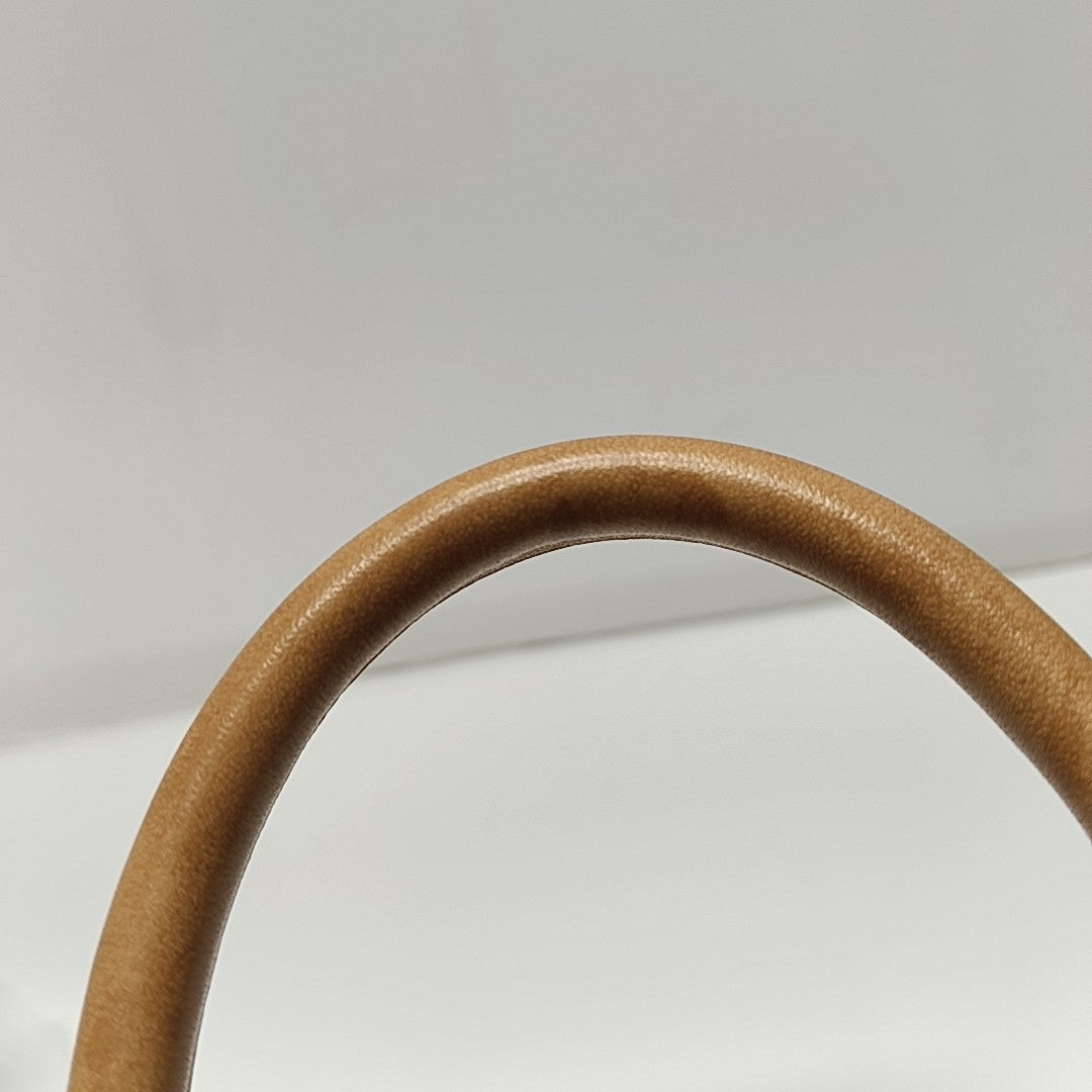 CLUNY PM Monogram Coated Canvas Brown
