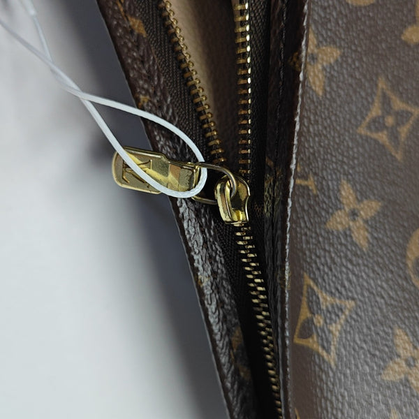TOILET POCKET 26 Monogram Coated Canvas Brown