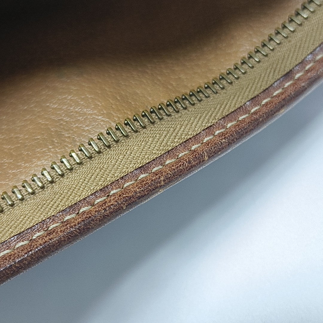 MACADAM CLUTCHES Coated Canvas Brown
