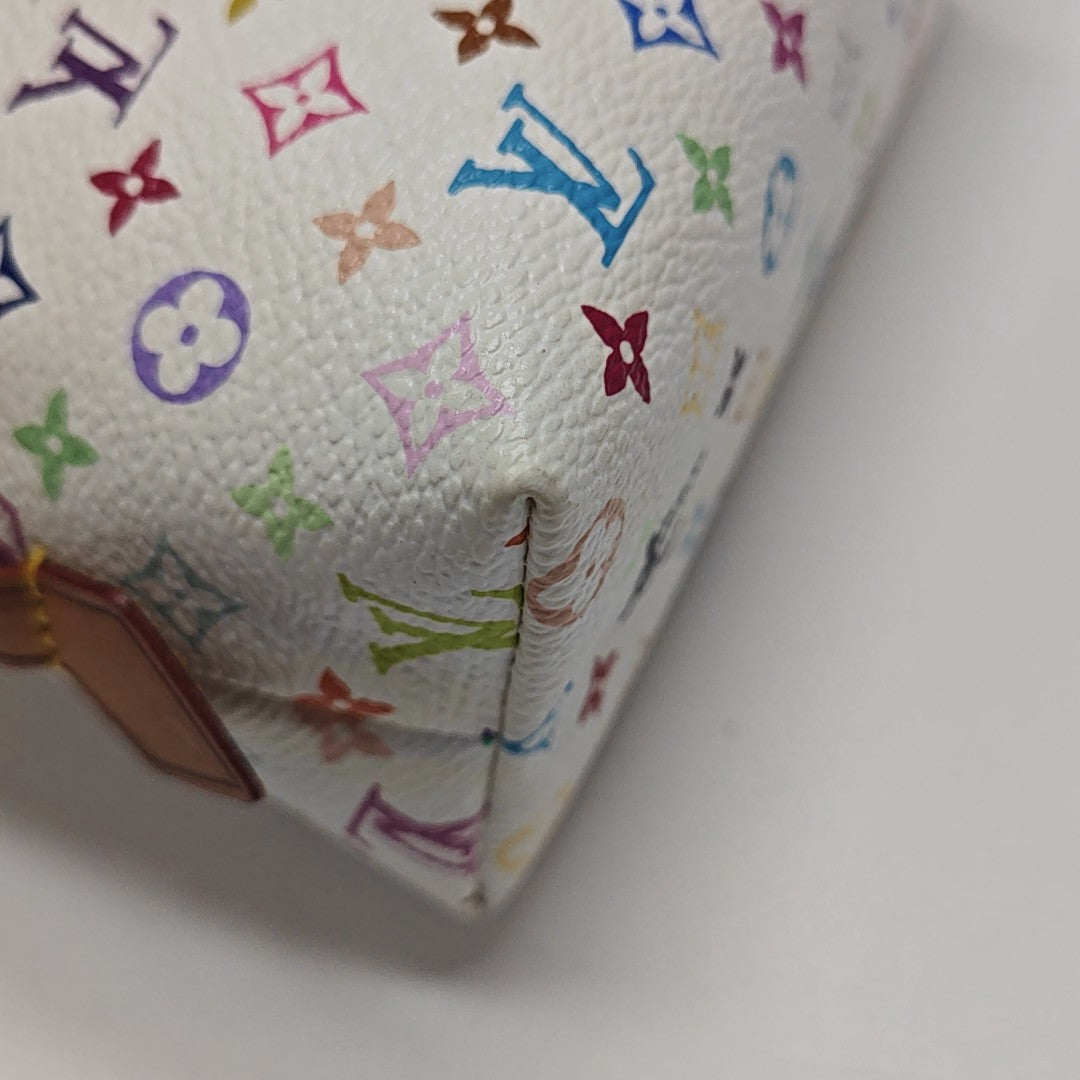 LV × TM COSMETIC PM Monogram Coated Canvas White