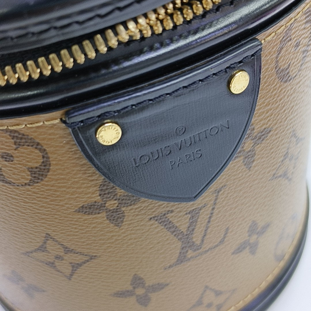 CANNES PM Monogram Coated Canvas Brown
