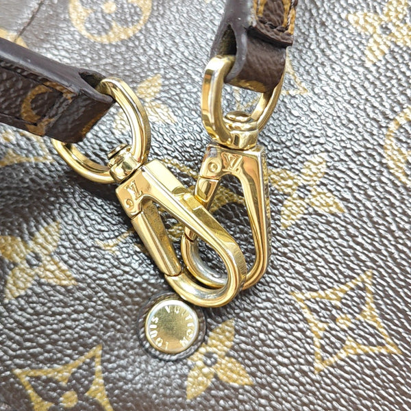 MONTAIGNE GM Monogram Coated Canvas Brown