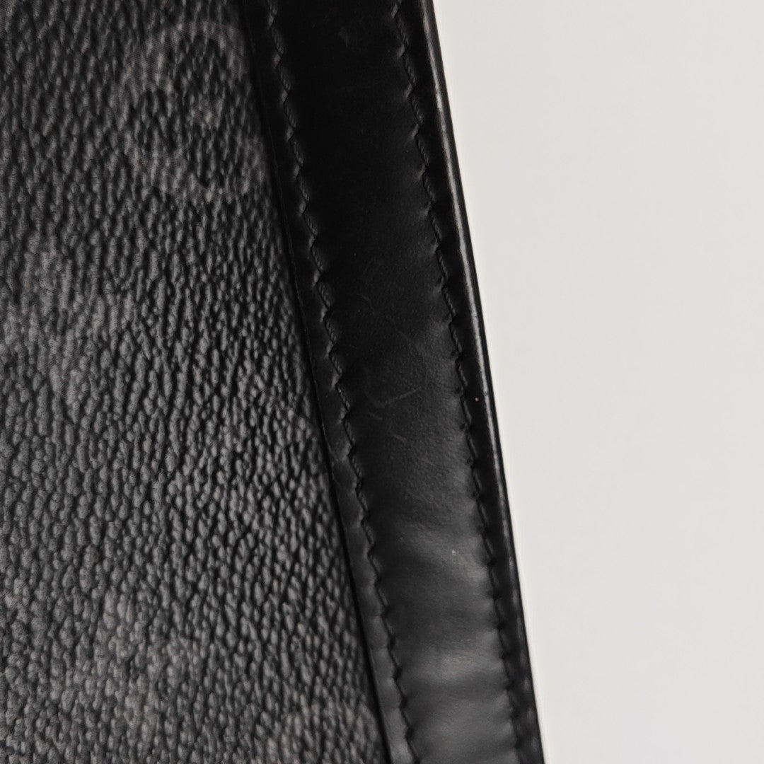 Pochette Voyag MM Monogram Coated Canvas Black