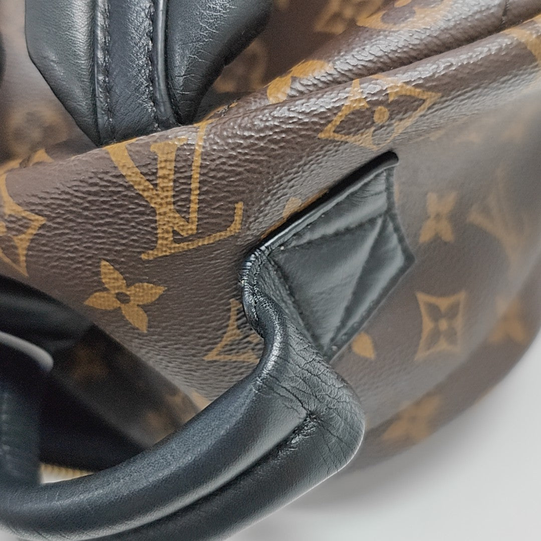 Monogram Coated Canvas Backpack Brown