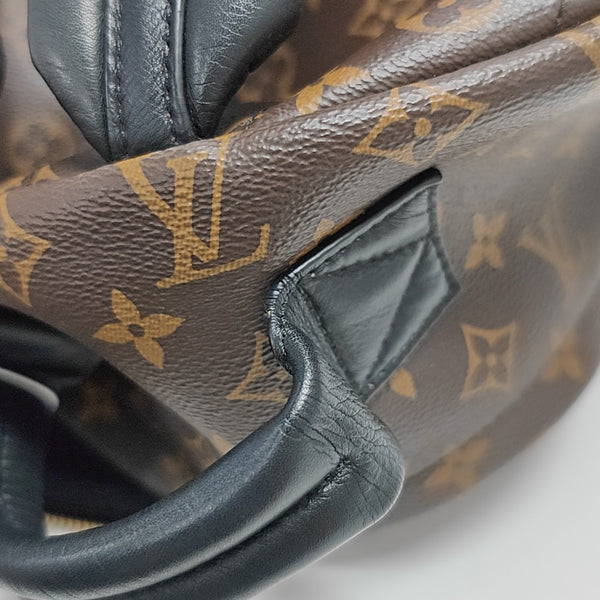 Monogram Coated Canvas Backpack Brown