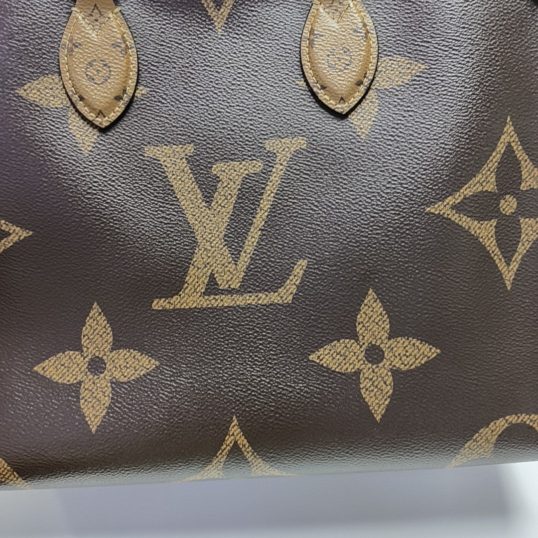 ONTHEGO MM Monogram Coated Canvas Brown