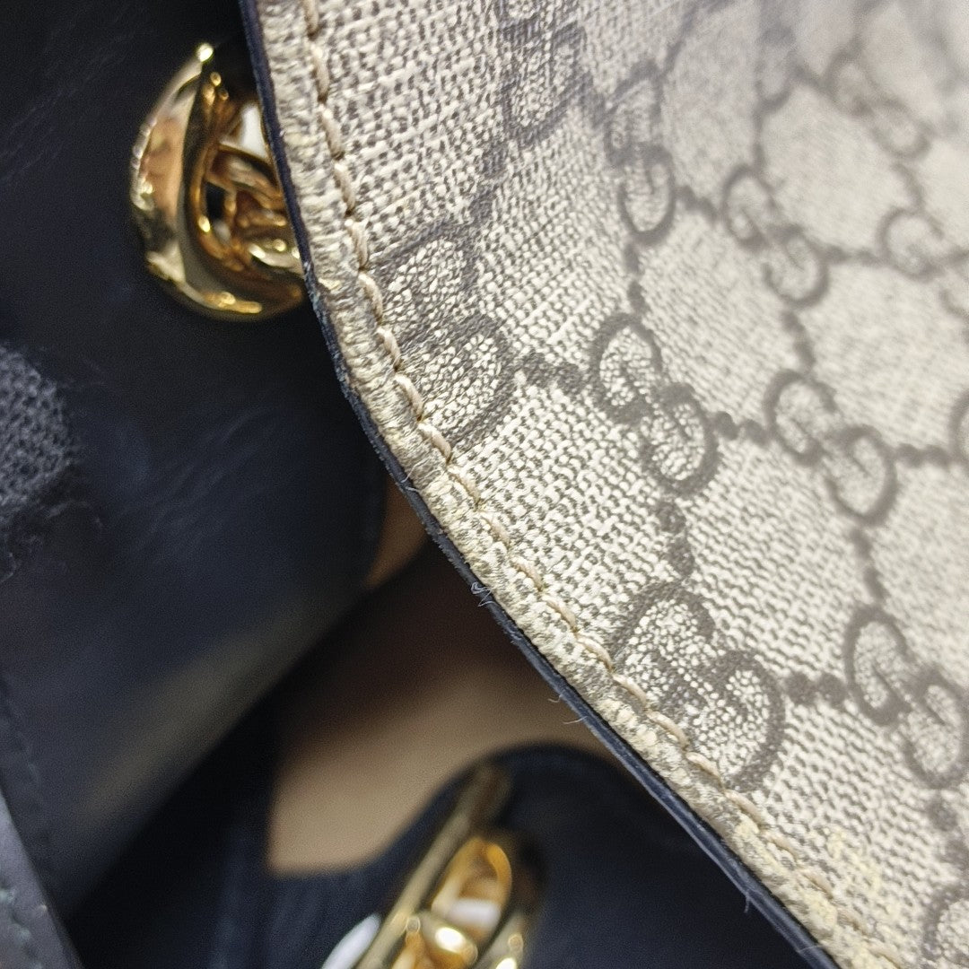 Padlock Medium Monogram Coated Canvas Beige