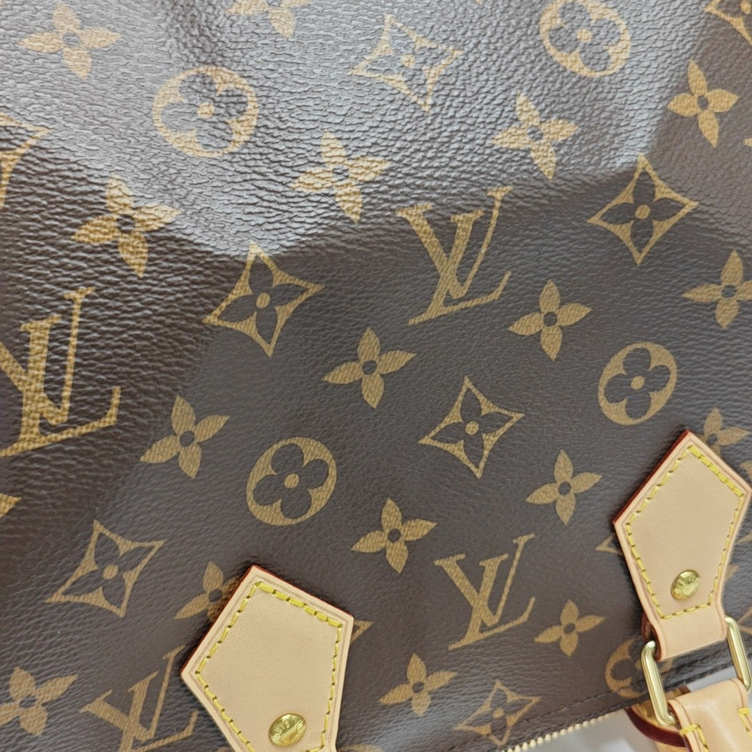 Authenticated pre-owned  SPEEDY 25 Monogram Coated Canvas Brown - Shoulder Bag at Looply