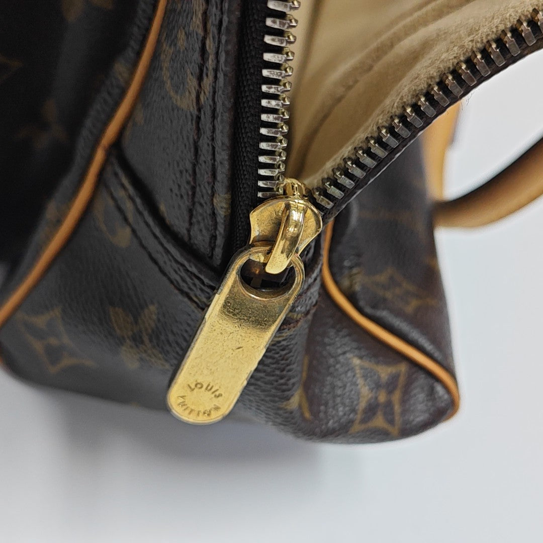MANHATTAN PM Monogram Coated Canvas Brown