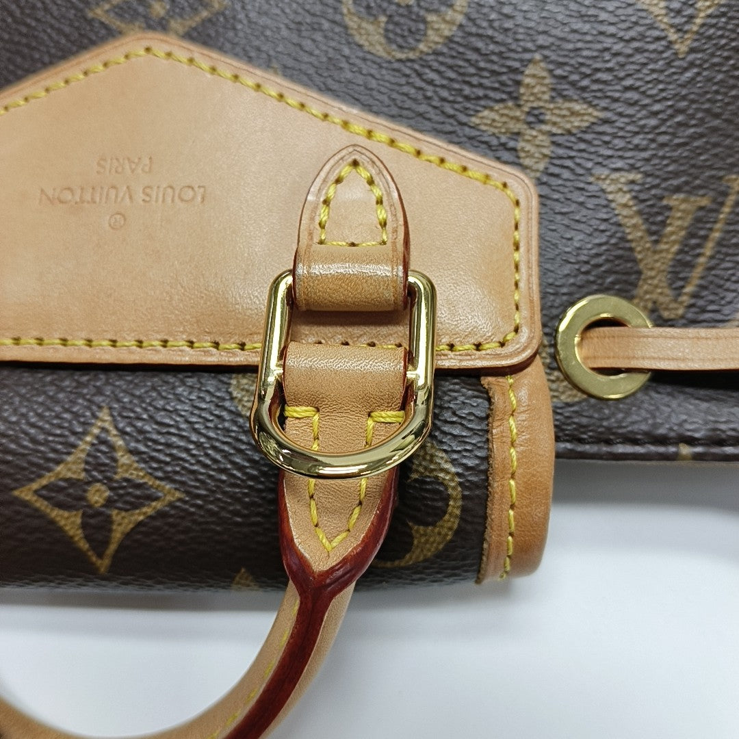 EXCURSION PM Monogram Coated Canvas Brown