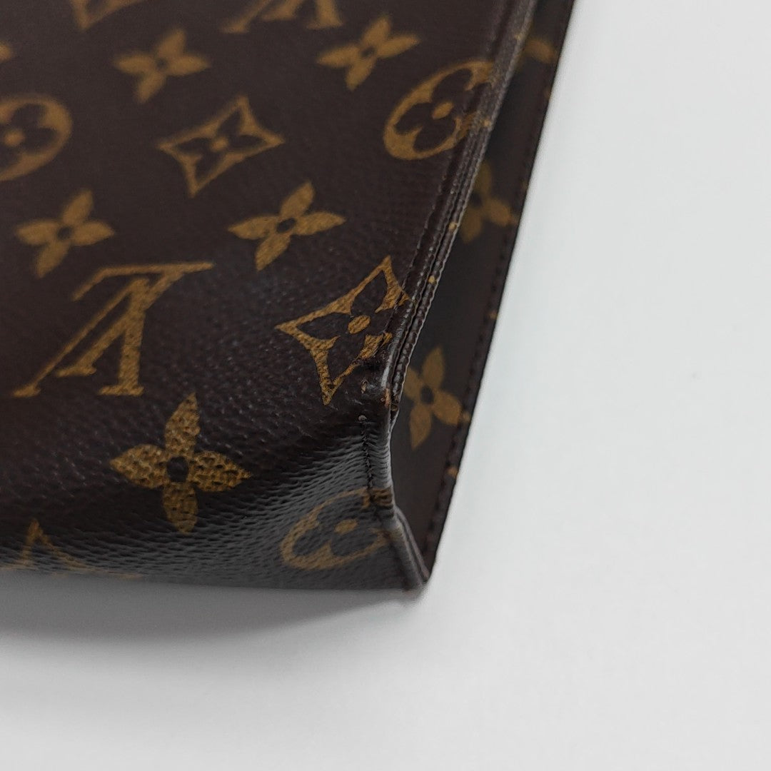 TOILET POCKET 26 Monogram Coated Canvas Brown