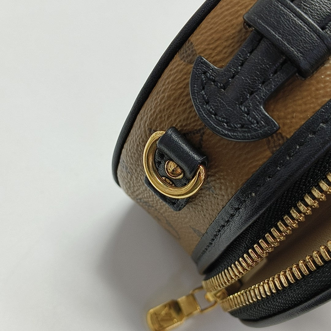 BOITE CHAPEAU Mini Monogram Coated Canvas Brown