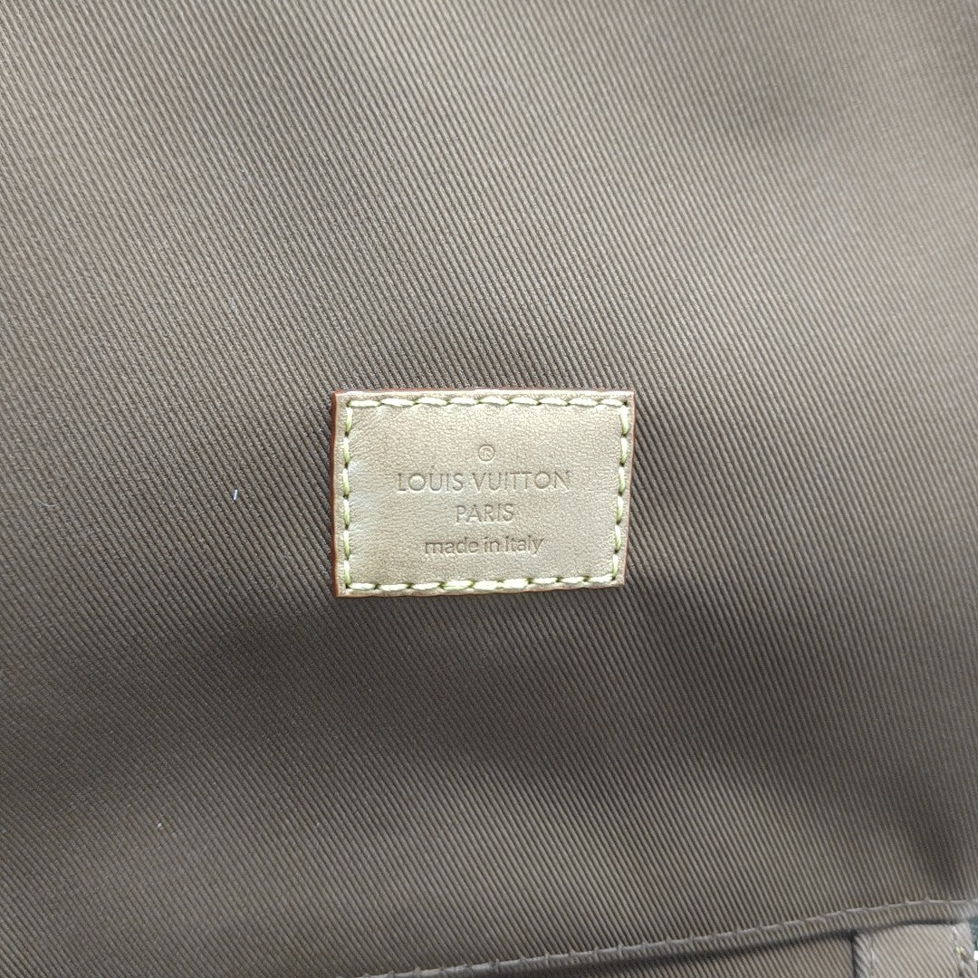 Monogram Coated Canvas Clutch Brown