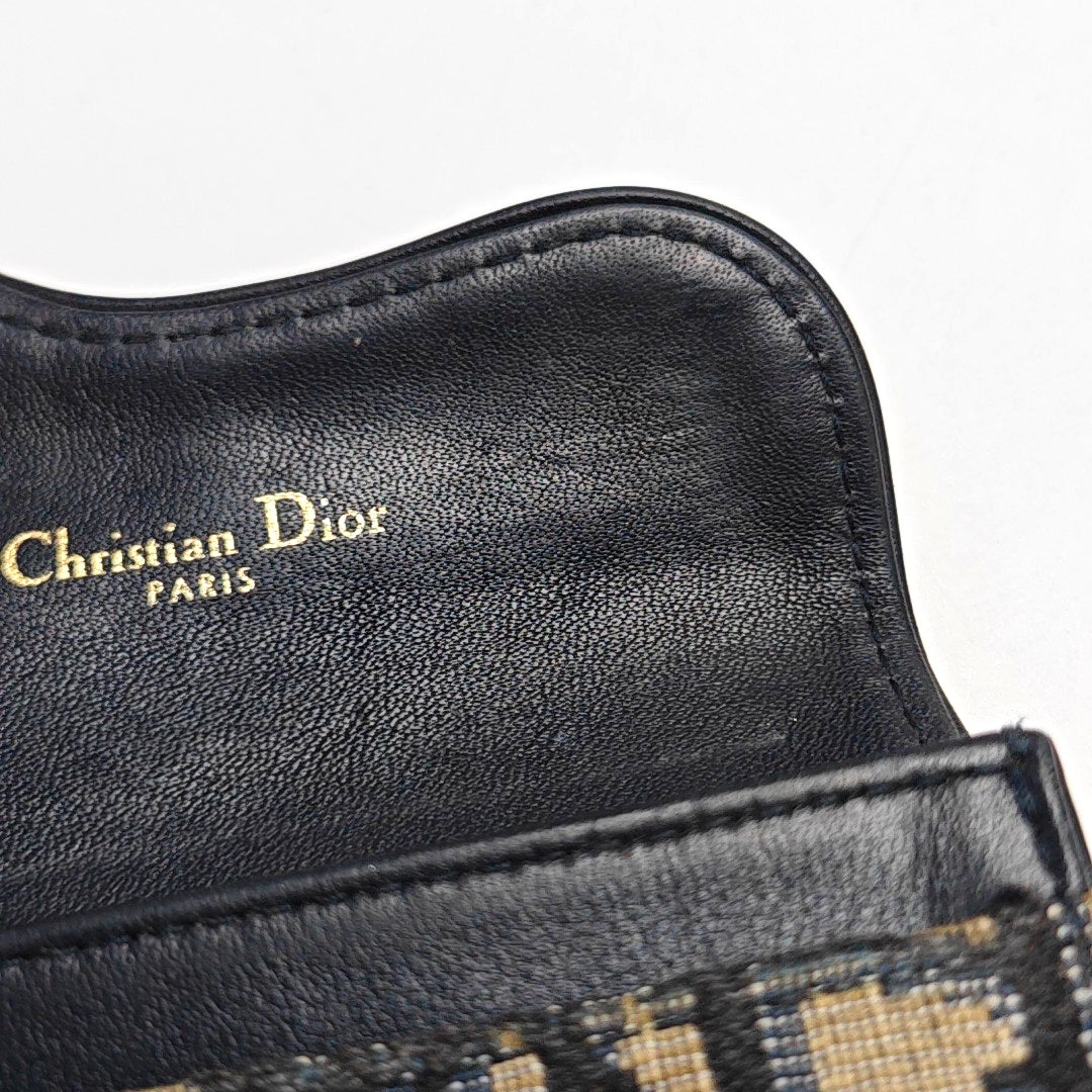 Authenticated pre-owned  Saddle Monogram Canvas Blue Card Holder - Card Holder at Looply
