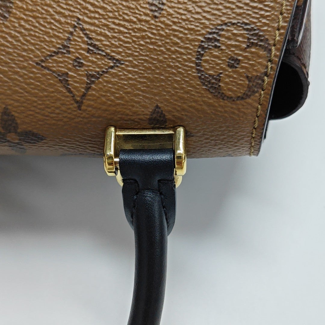 EDEN Monogram Coated Canvas Brown