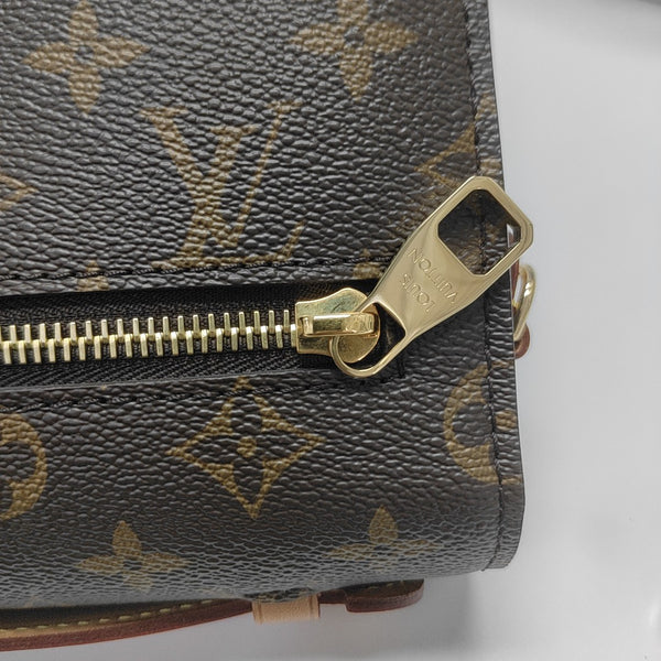 MÉTIS MM Monogram Coated Canvas Brown