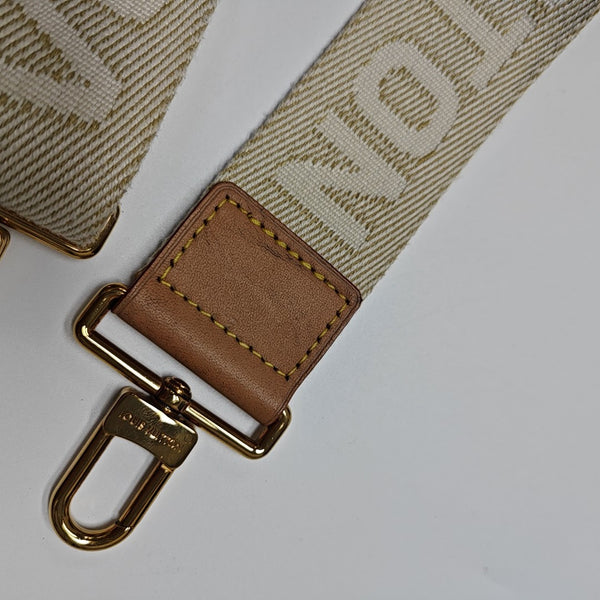 UTILITY Monogram Coated Canvas Brown