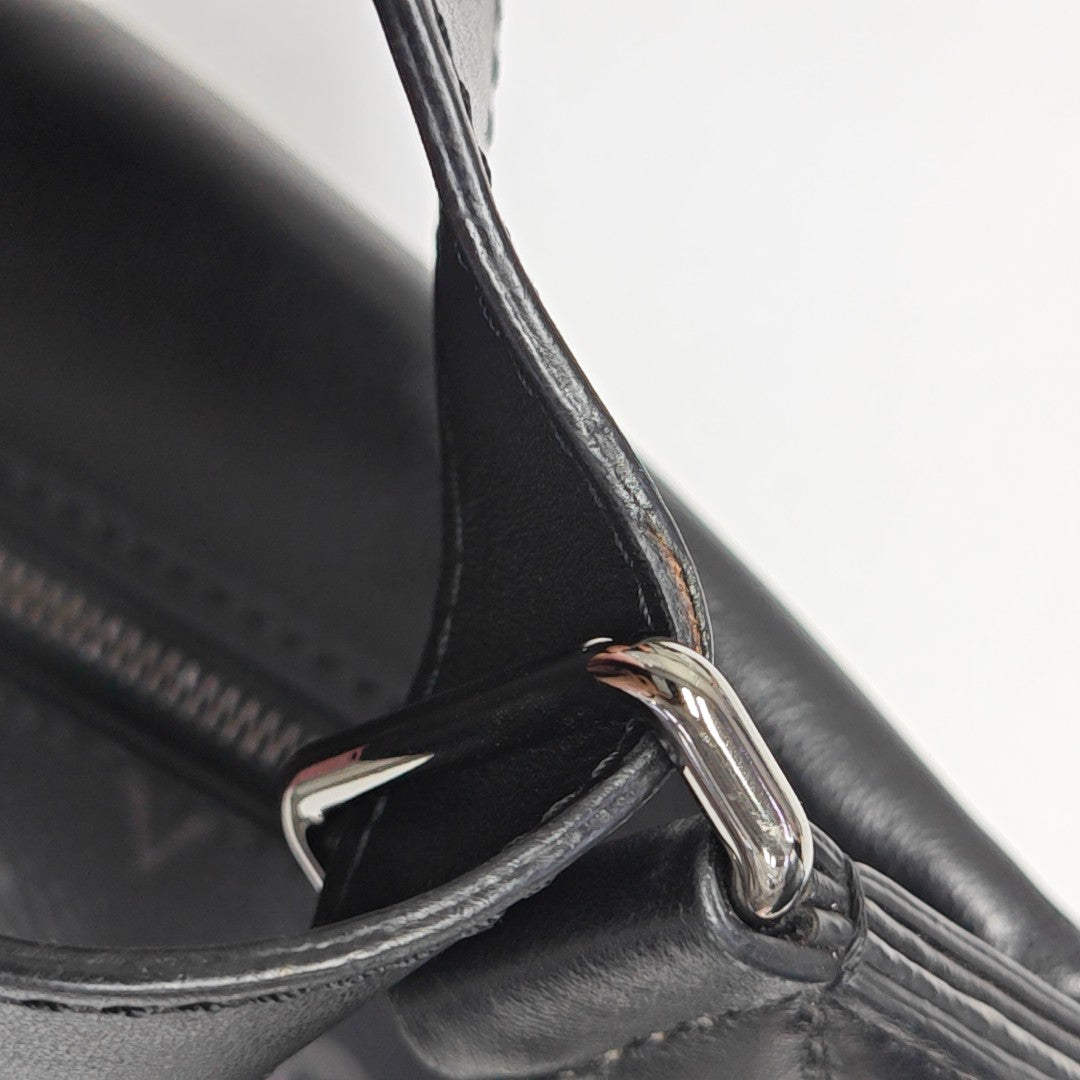 DISCOVERY Monogram Coated Canvas Black