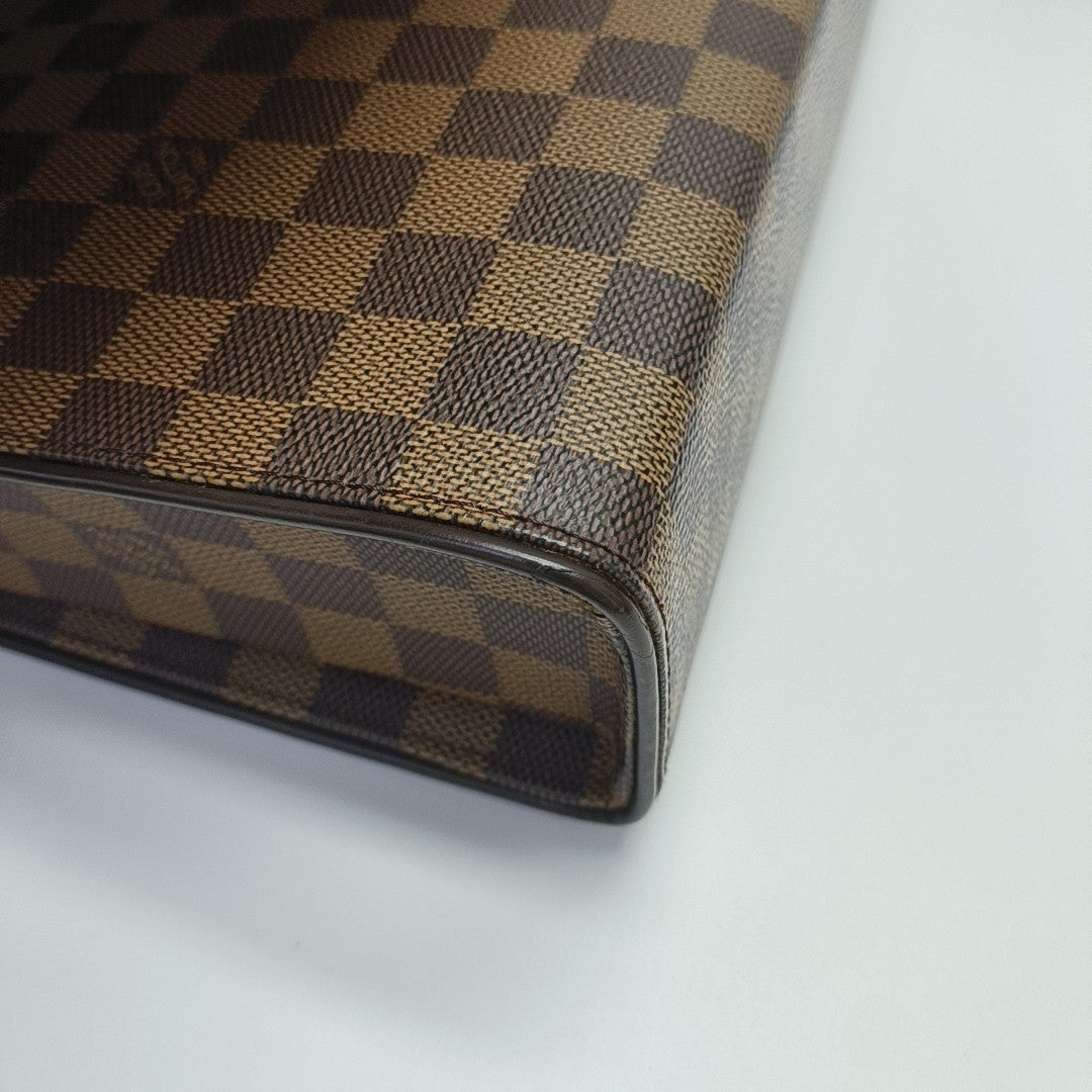 TRIBECA Damier Ebene Coated Canvas Brown