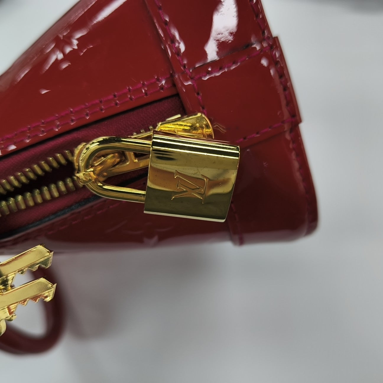 ALMA BB Monogram Patent Leather Red