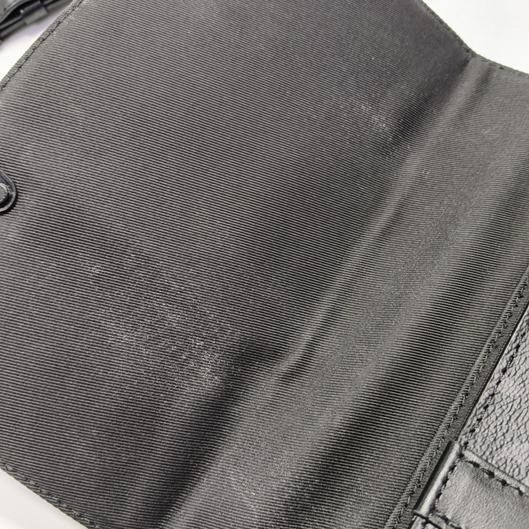 TRUNK PM Monogram Coated Canvas Black