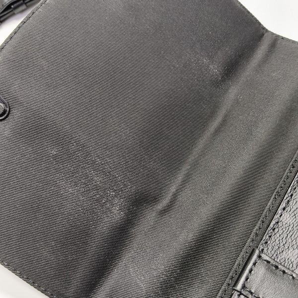 TRUNK PM Monogram Coated Canvas Black