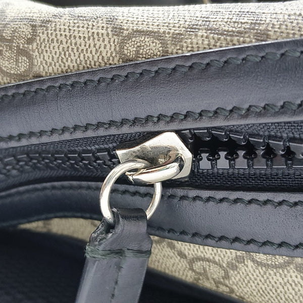 Monogram Coated Canvas Backpack Black
