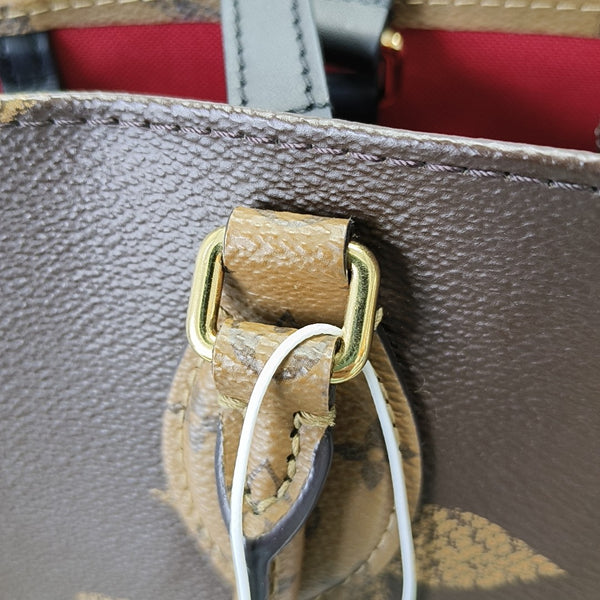 ONTHEGO MM Monogram Coated Canvas Brown