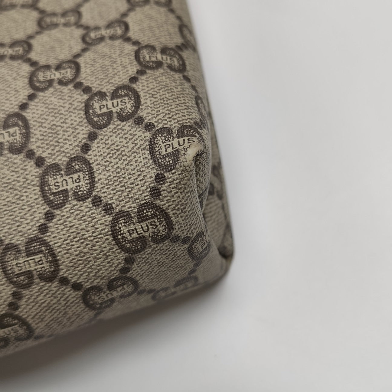 Monogram Coated Canvas Clutch Beige