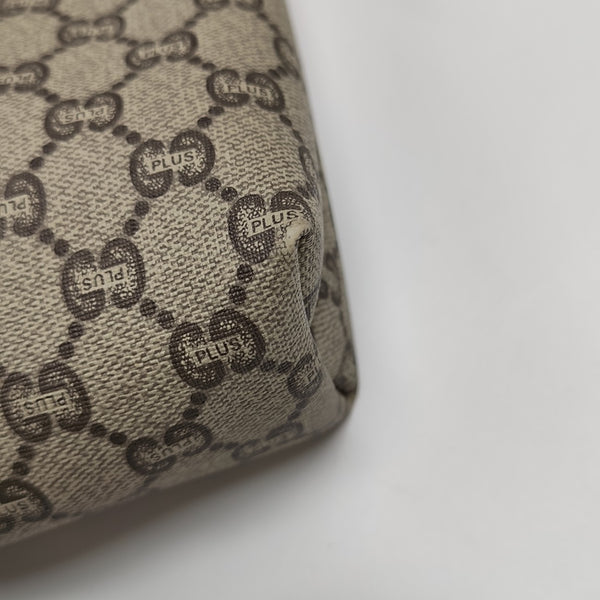 Monogram Coated Canvas Clutch Beige