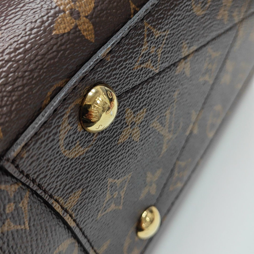 MONTAIGNE Monogram Coated Canvas Brown
