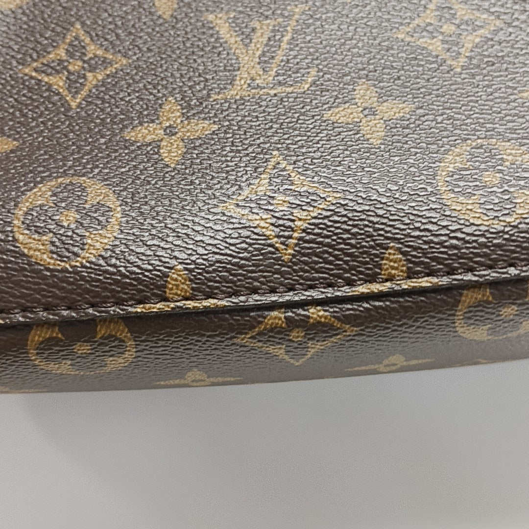 NÉONOÉ MM Monogram Coated Canvas Brown
