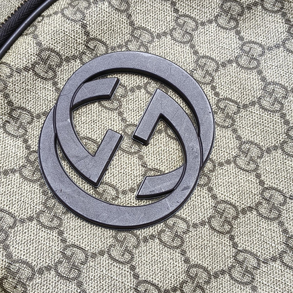 Monogram Coated Canvas Backpack Brown