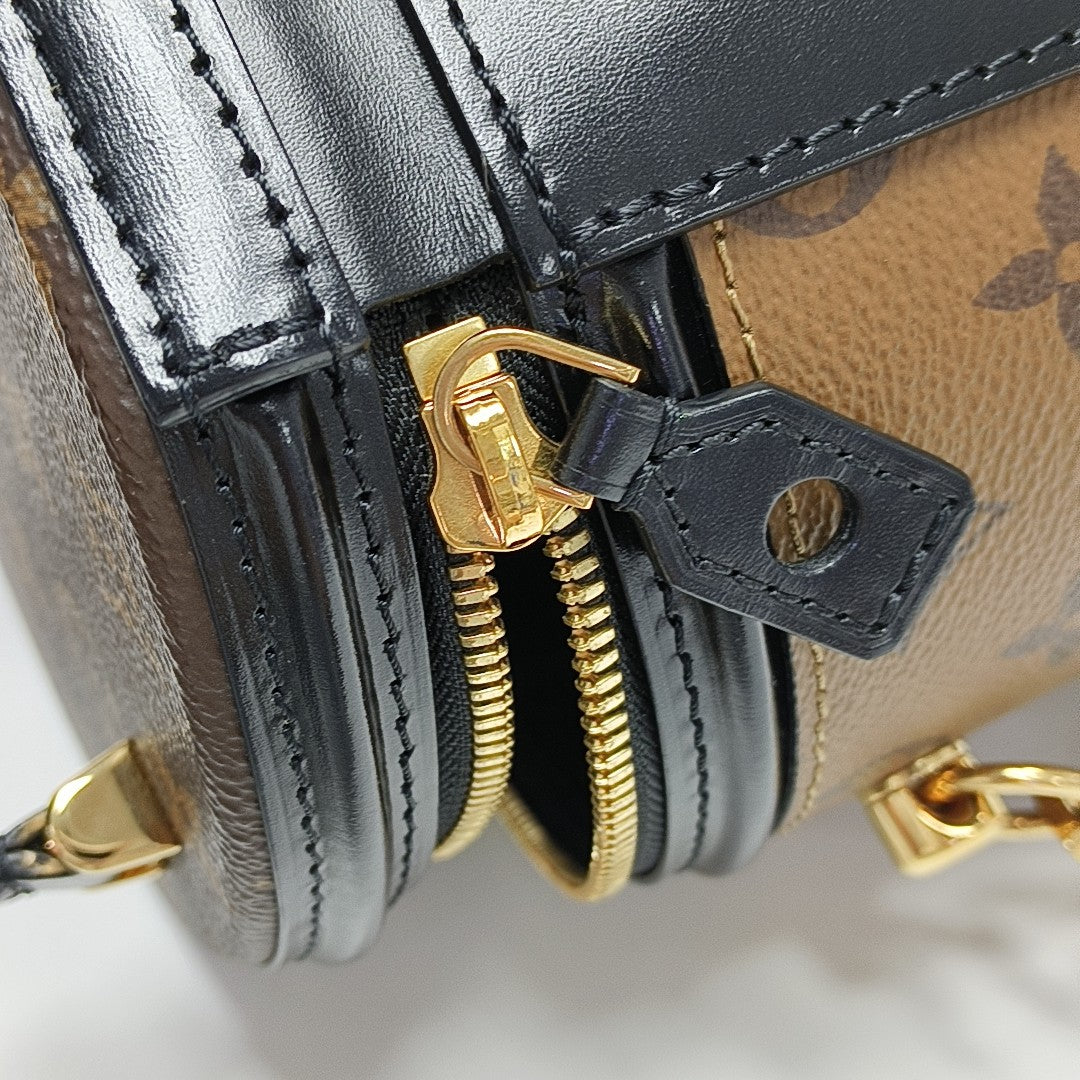 CANNES PM Monogram Coated Canvas Brown