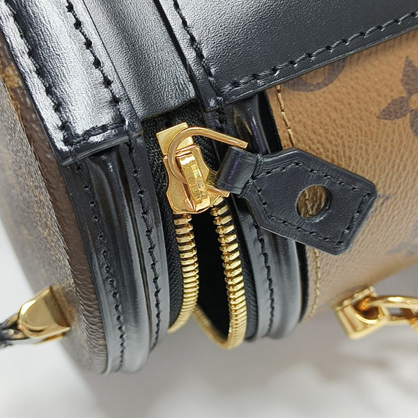 CANNES PM Monogram Coated Canvas Brown