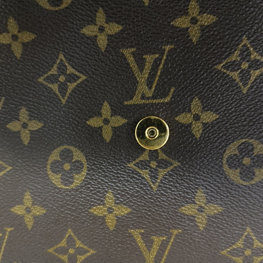 LOOPING PM Monogram Coated Canvas Brown