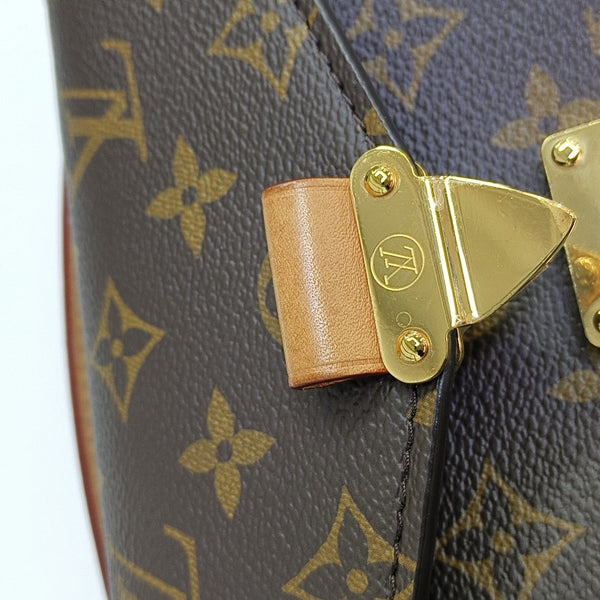 MÉTIS EAST WEST Monogram Coated Canvas Brown