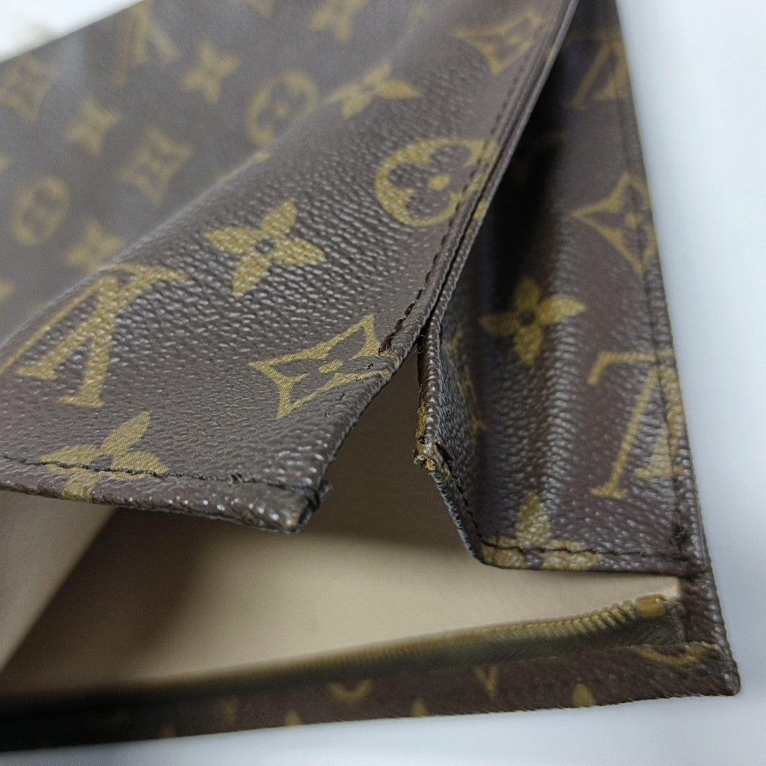 TOILET POCKET 26 Monogram Coated Canvas Brown