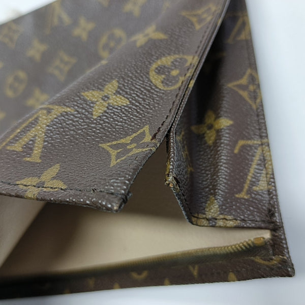 TOILET POCKET 26 Monogram Coated Canvas Brown