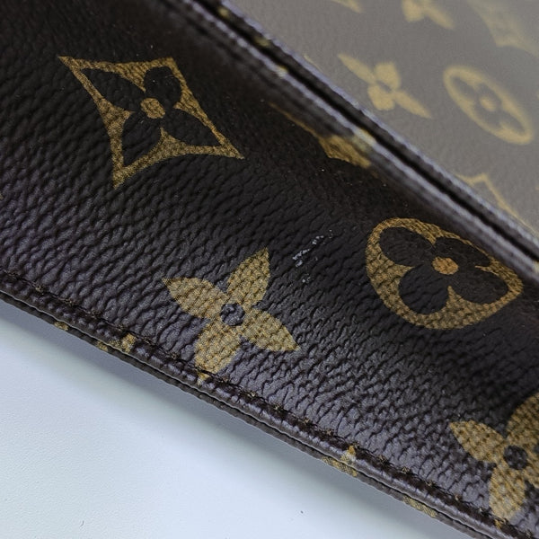 TOILET POCKET 26 Monogram Coated Canvas Brown