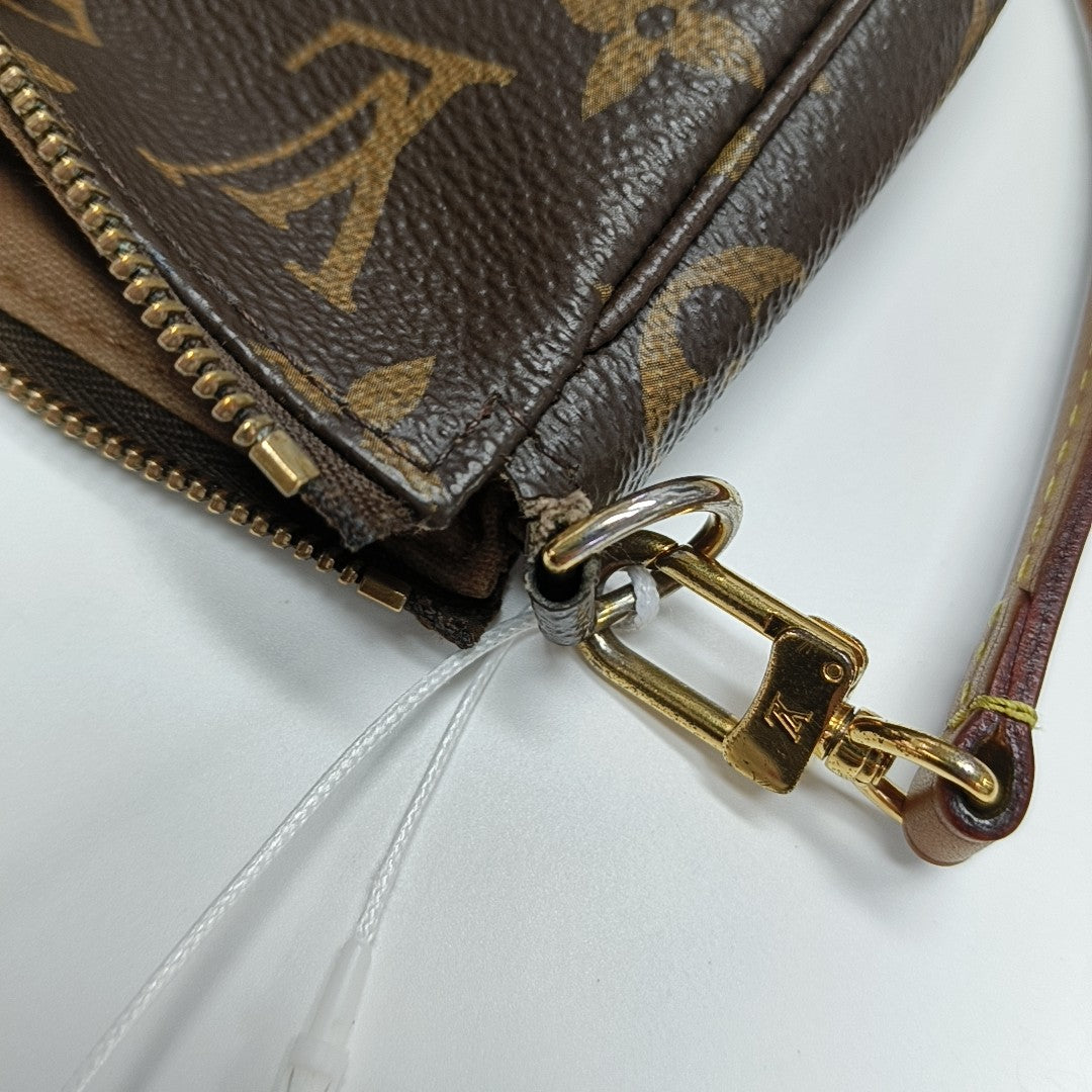 ACCESSOIRES GM Monogram Coated Canvas Brown