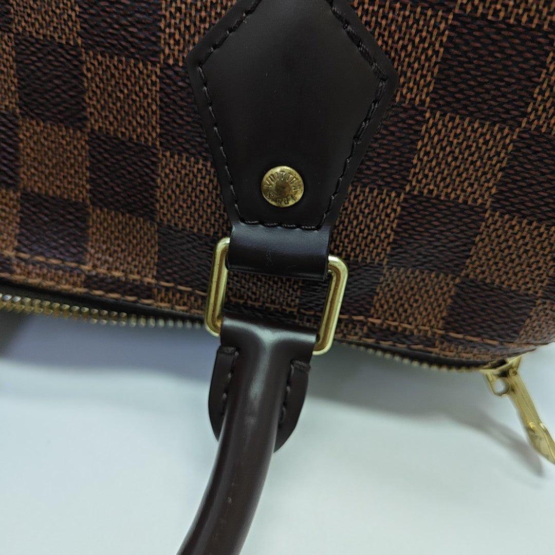 SPEEDY 25 Damier Ebene Coated Canvas Brown