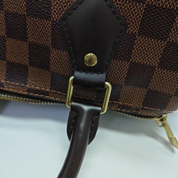 SPEEDY 25 Damier Ebene Coated Canvas Brown