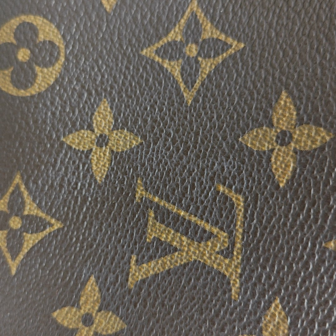 TOILET POCKET 15 Monogram Coated Canvas Brown